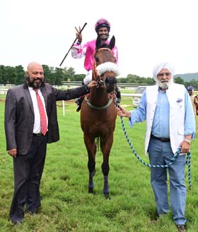 Mind Games (Varun up), winner of the HEGGADADEVANAKOTE PLATE being led in trainer Pratap Kamath M on Wednesday races at Mysore. 